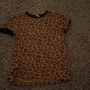 Girls Dillards Cheetah Print shirt.